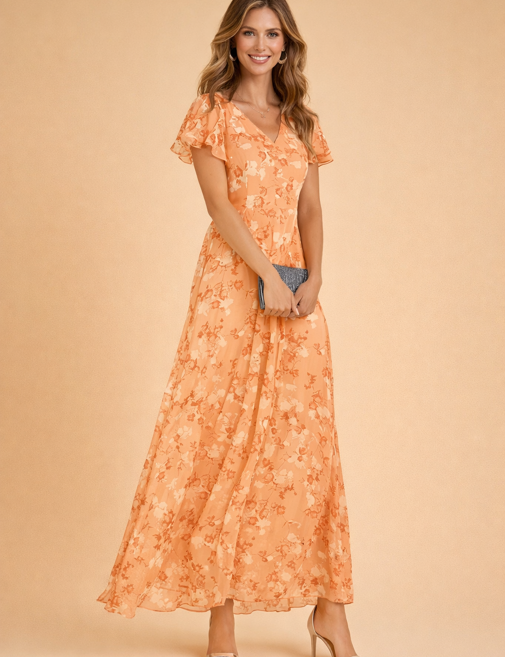 european-model-orange-floral-maxi-dress-full-body-studio-posed-shot.png