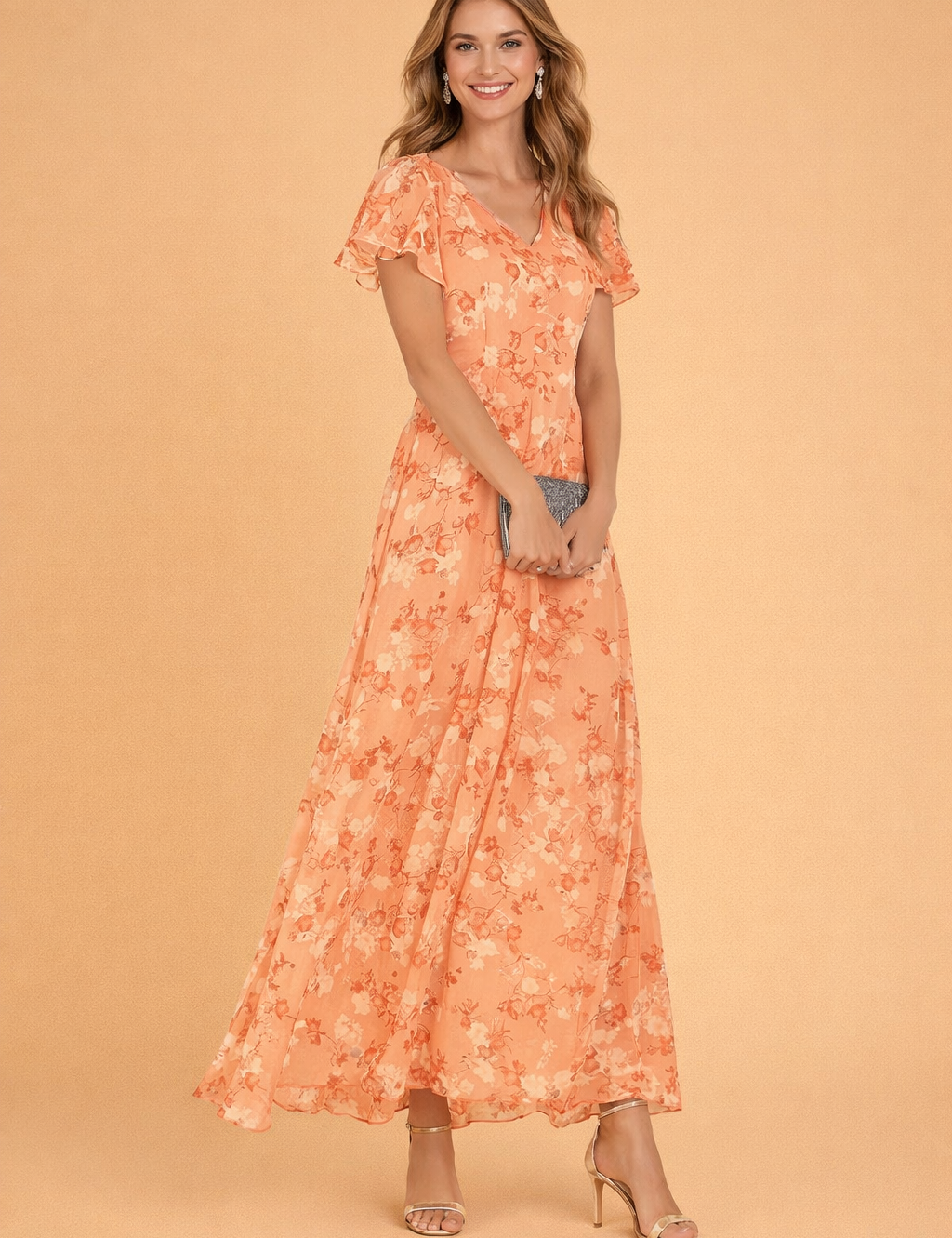 european-model-posing-peach-floral-maxi-dress-warm-sand-studio-shot.png