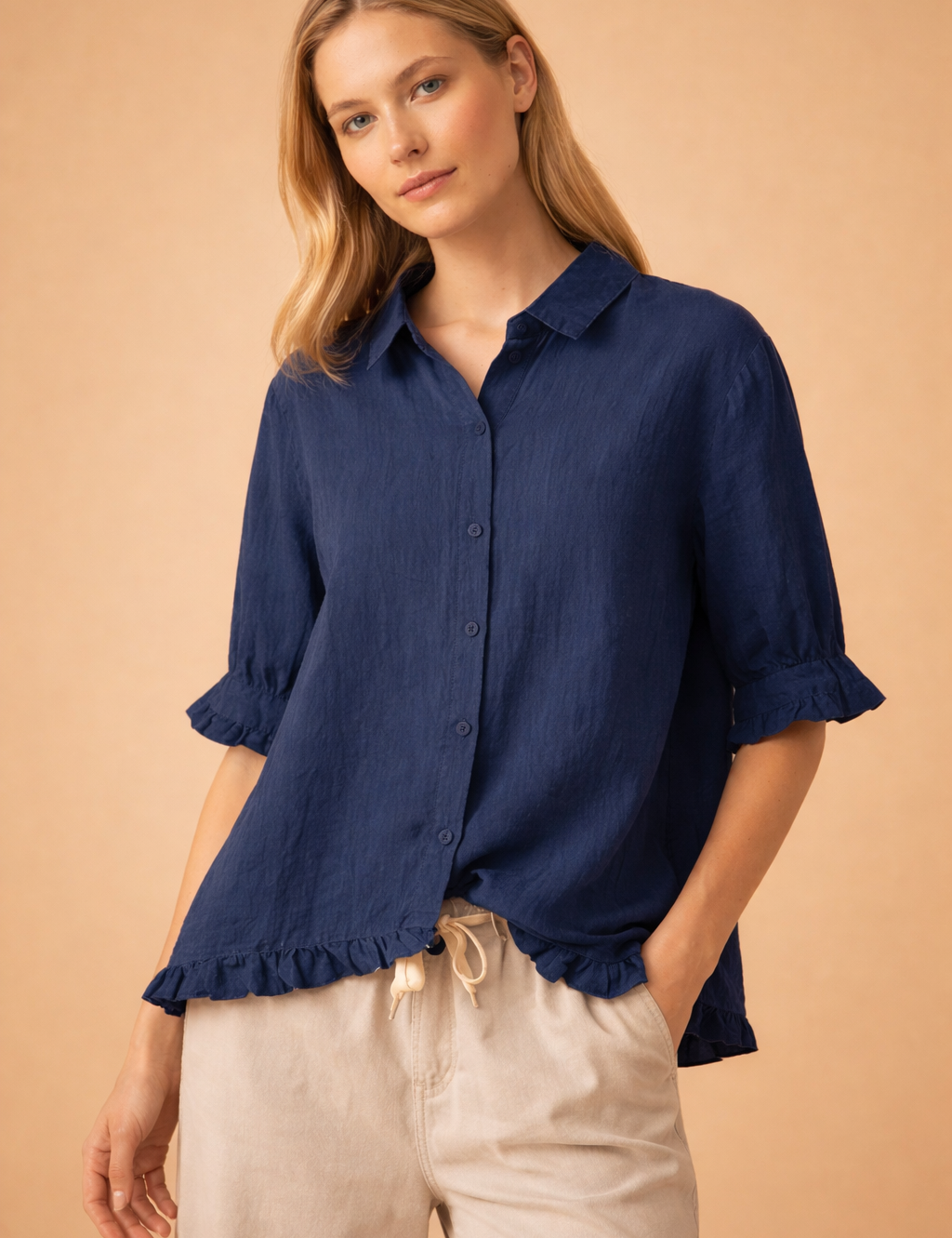 navy-button-down-ruffle-hem-blouse-relaxed-european-model-pose.png