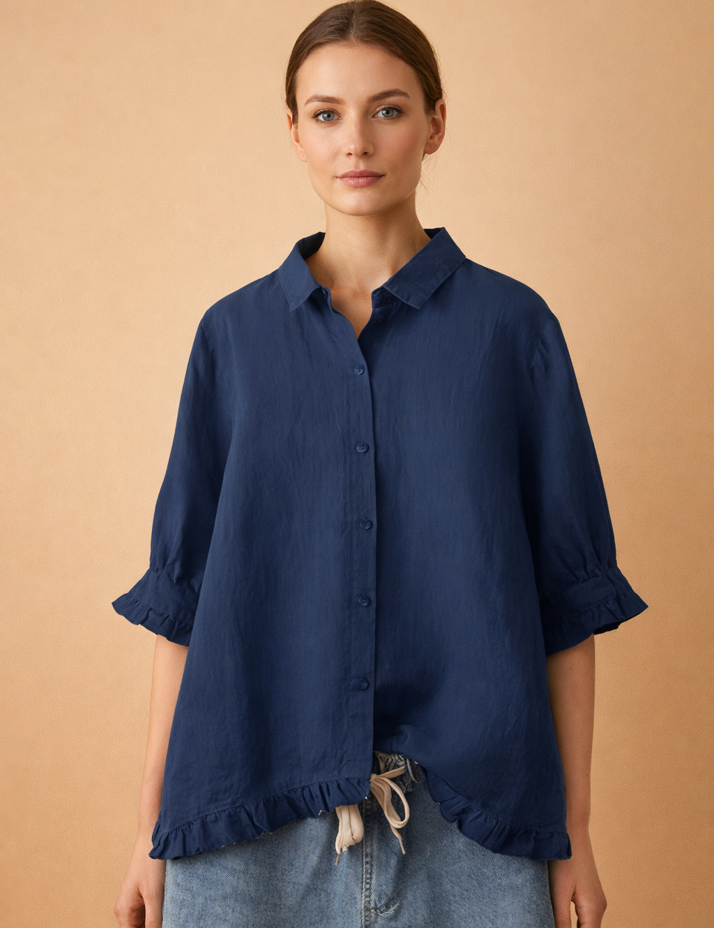 navy-button-down-ruffle-hem-blouse-relaxed-european-model-pose1.png