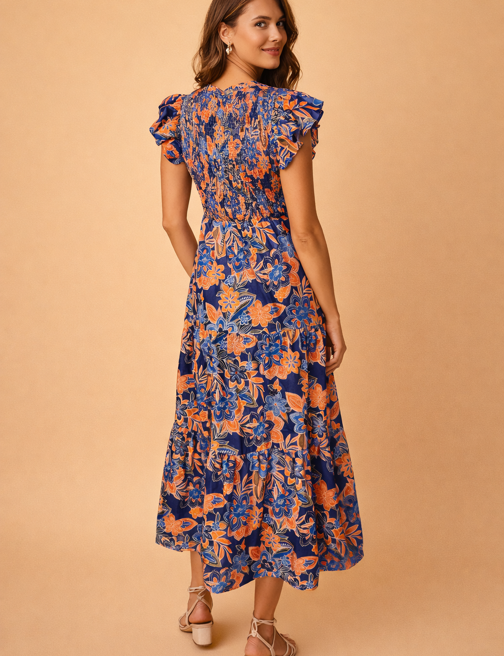 polish-model-backview-blue-orange-floral-midi-dress-studio-posed-shot.png