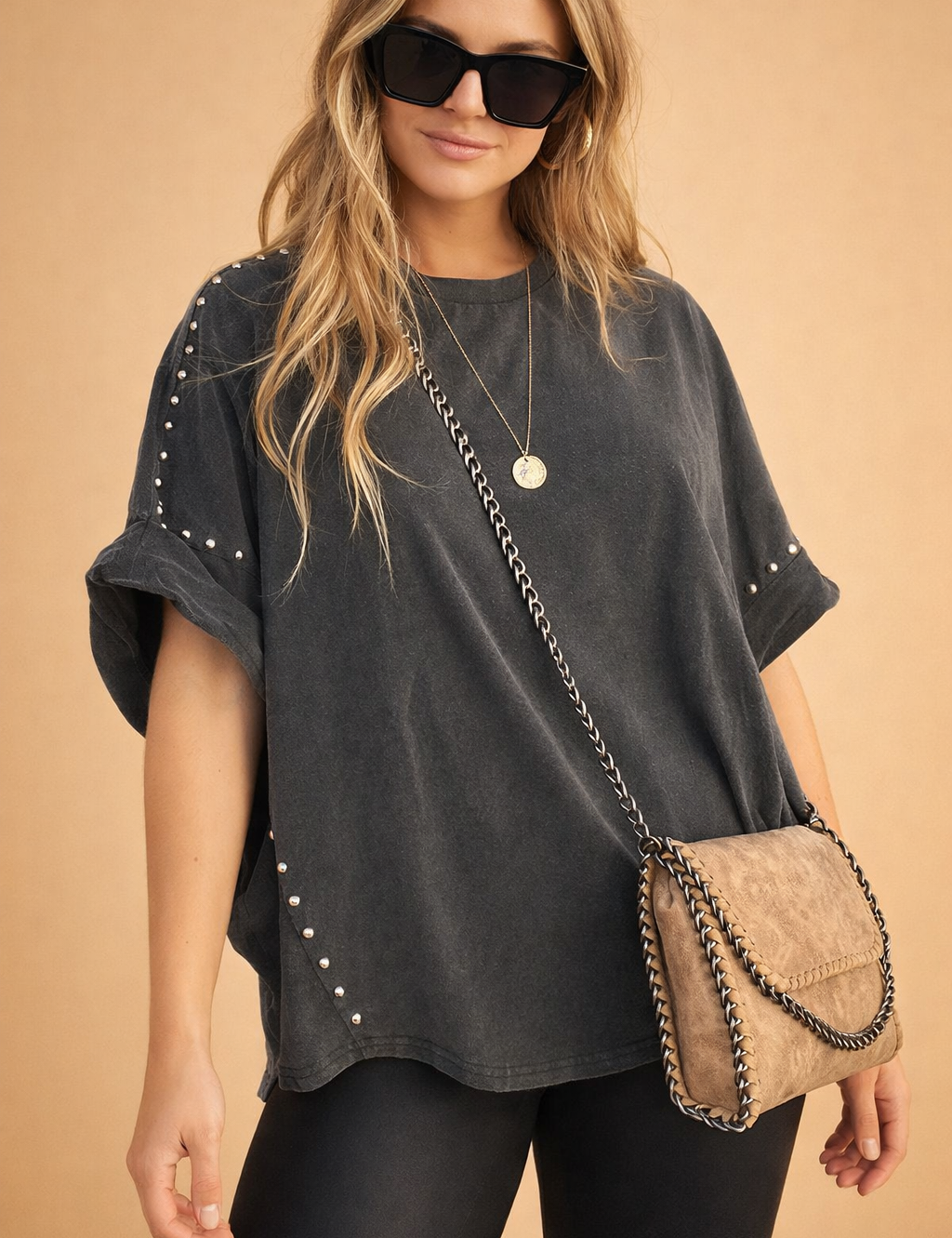 polish-model-charcoal-studded-oversized-womens-top-studio-posed-shot-4x5-premium-ecommerce.png