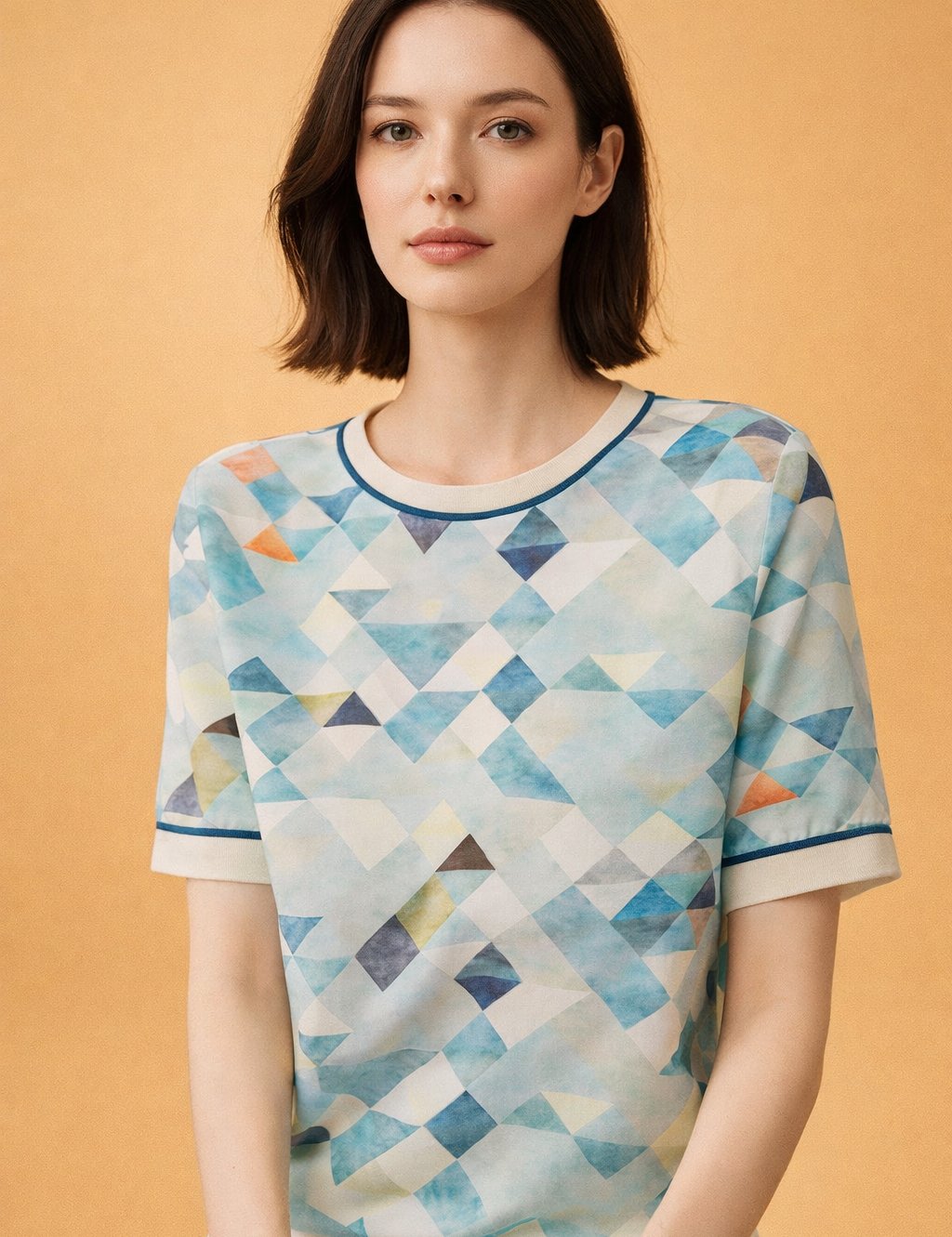 polish-model-geometric-print-short-sleeve-crewneck-top-editorial-studio-shot.png