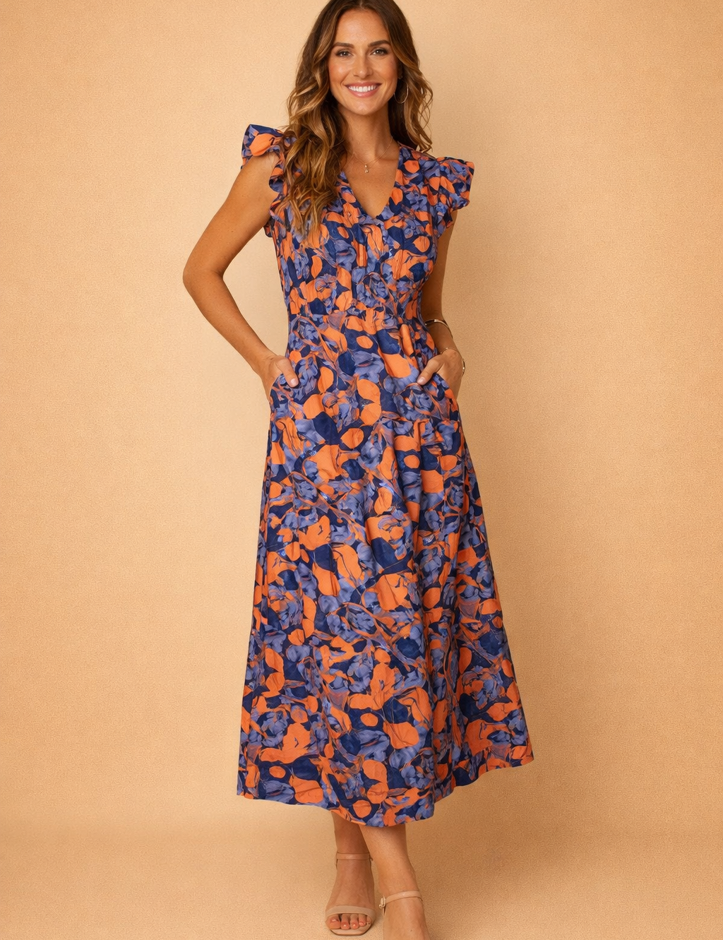 polish-model-wearing-blue-orange-floral-maxi-dress-studio-posed-full-length_2.png